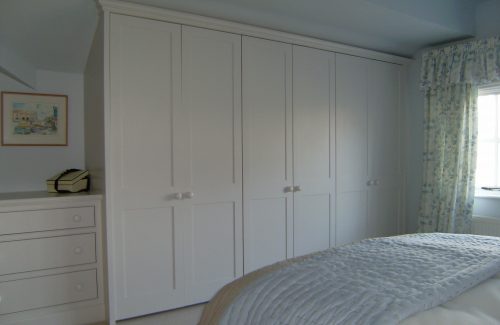 White fitted wardrobe and drawers