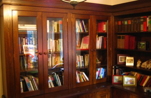 Dark wood corner bookcase